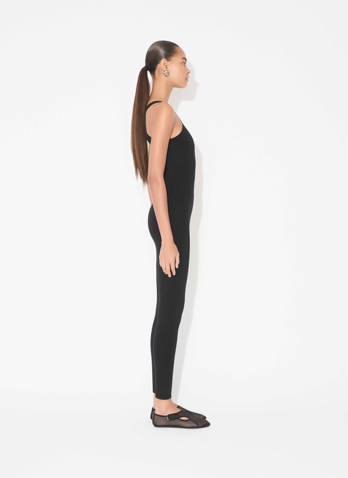 COMPACT JERSEY TECHNICAL JUMPSUIT ALAÏA BLACK COMPACT JERSEY TECHNICAL JUMPSUIT